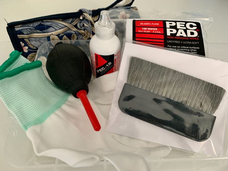 Gloves, a bulb blower, an anti-static brush and PEC cleaning fluid and pads
