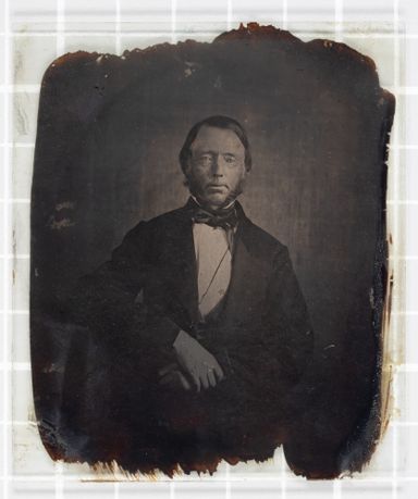 Un uncased ambrotype showing the dark backing on the glass negative which made it look positive